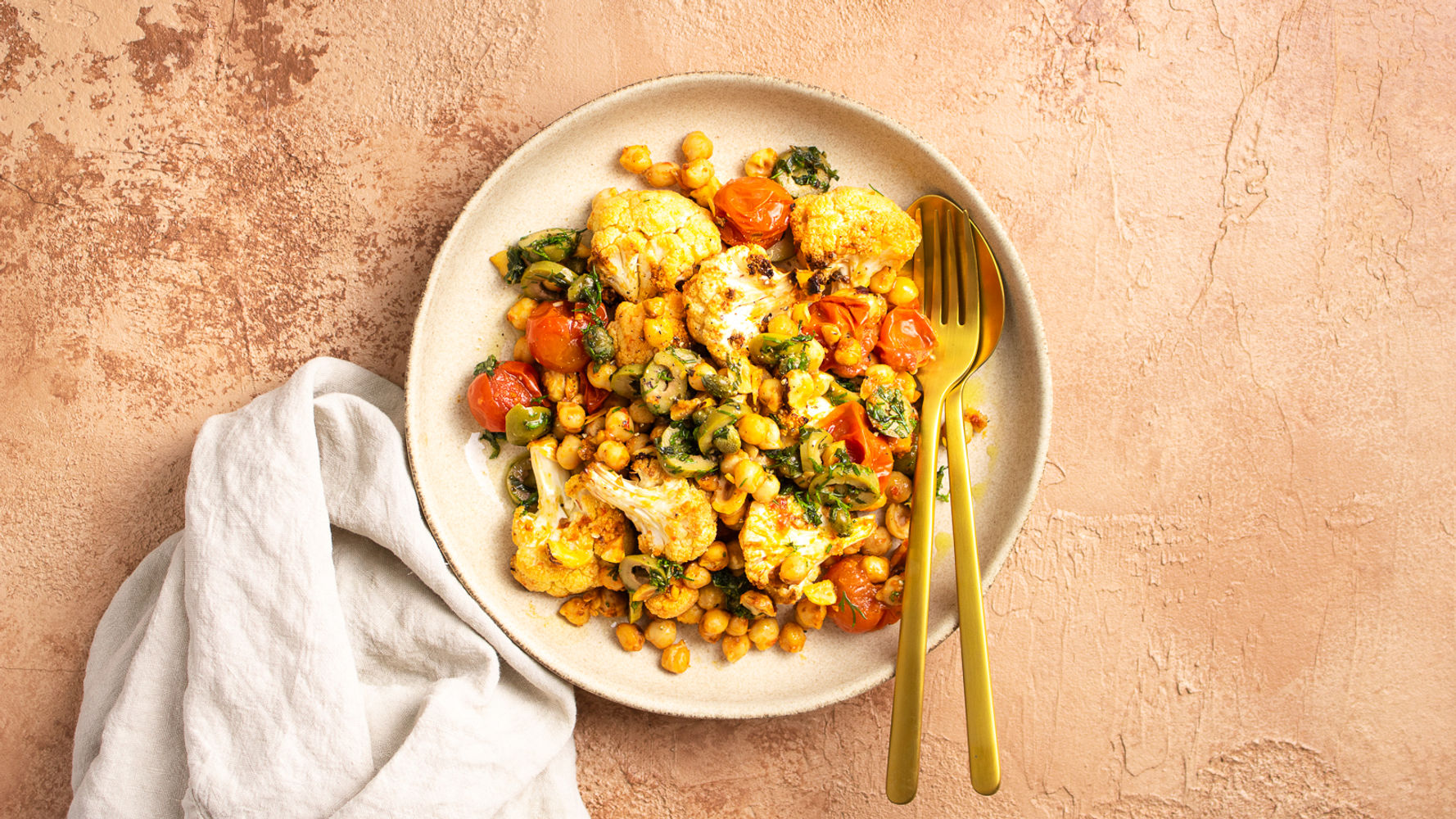 Roast Harissa Cauliflower and Tomato Traybake | The Doctor's Kitchen