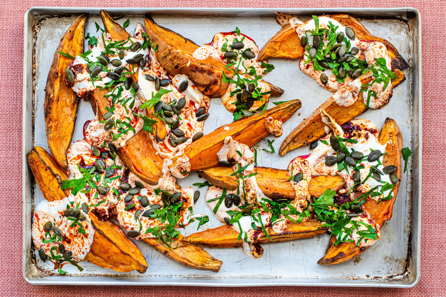 Roasted Sweet Potatoes with Harissa Yoghurt, Parsley and Pumpkin Seeds | The Doctor's Kitchen