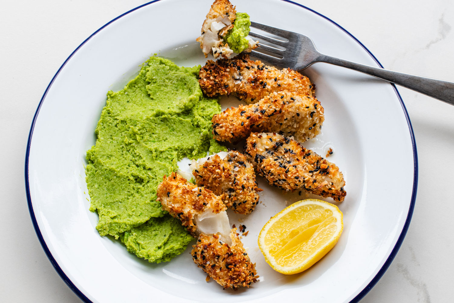 Sesame Coconut Fish Fingers with Mushy Peas, Broad Beans and Edamame