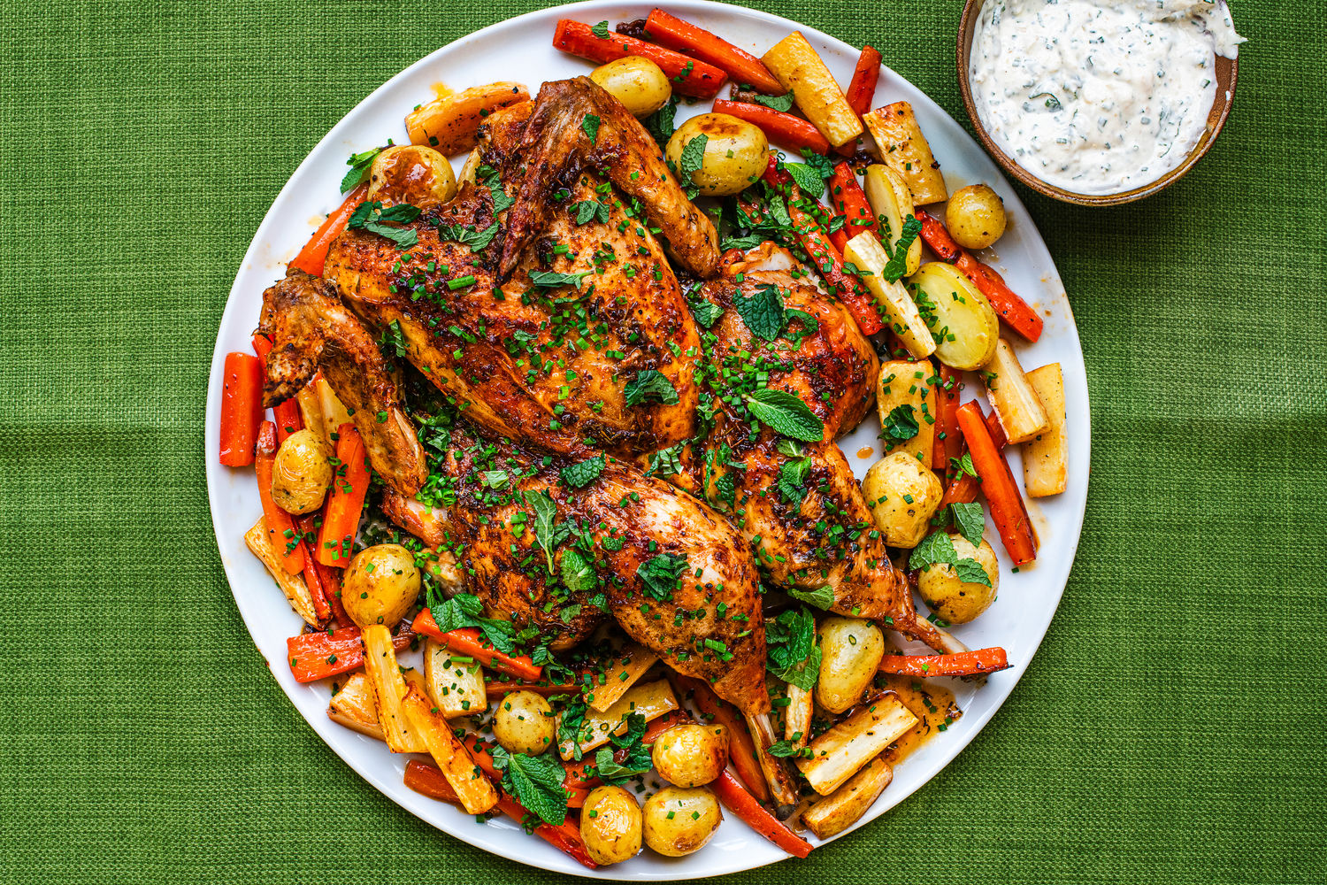 Spiced Spatchcock Chicken, Roasted Roots and Preserved Lemon Yoghurt | The Doctor's Kitchen